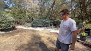 Matt surveying the freshly cleared backyard