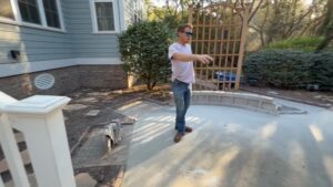 curved seat wall taking shape with gravel base installed in the patio field